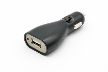 Black USB electronics device car charger isolated on white