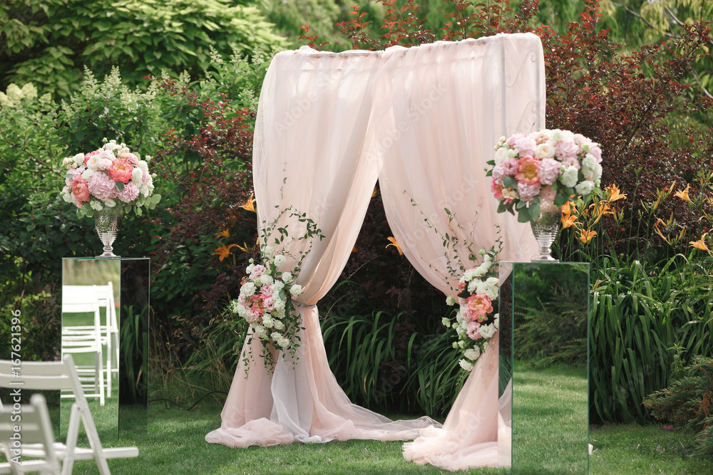 Wall mural arch and chairs for the wedding ceremony