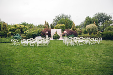 Arch and chairs for the wedding ceremony