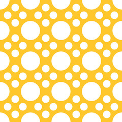 Seamless bright yellow and white fancy complex polka dot textile pattern vector