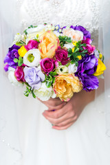 Wedding bouquet in bride's hands