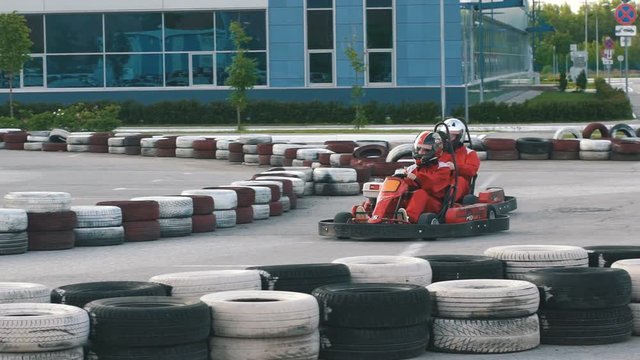 a young couple go karts
