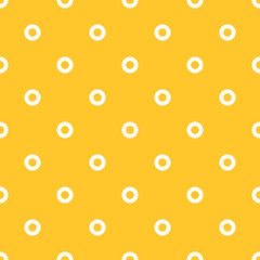 Seamless bright yellow and white simple rings polka dot pattern vector