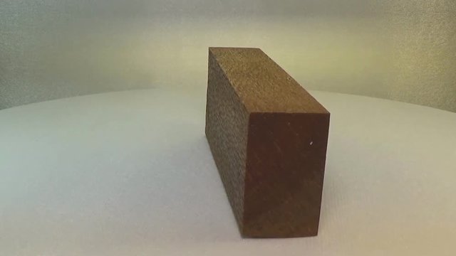 Rotating the block of wood lacewood.