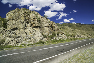 Asphalt road in the mountains of Altai