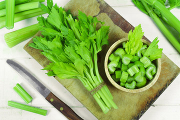 Fresh green celery isolated on white background