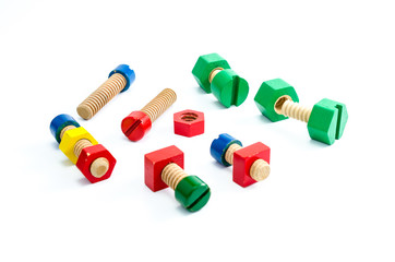 Colorful wooden nuts and bolts toy