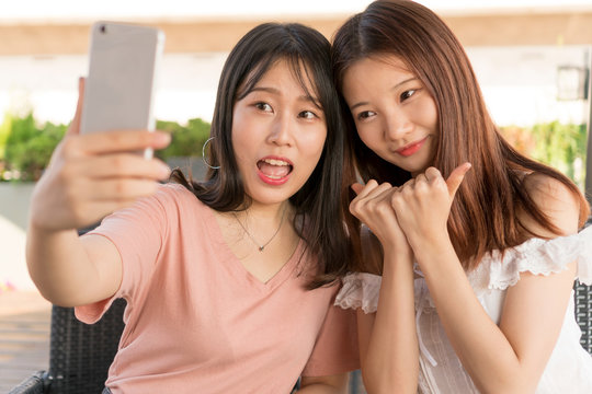 tow girls  making selfie