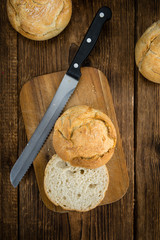 Fresh made Rolls (German style) on a rustic background