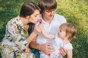 parents play with their daughter