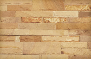 Background of modern stone brick wall texture, abstract sand wall or granite wall in natural patterns for design art work.