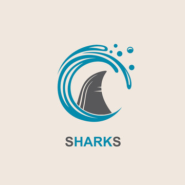 icon of angry shark fin with sea waves