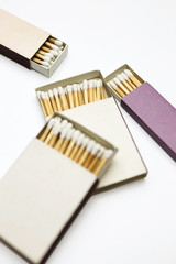 Closeup of matchboxes, isolated on white	