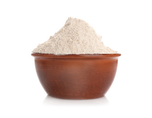 Bowl with oat flour on white background