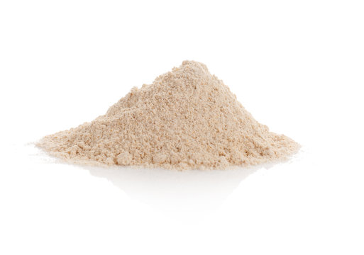 Heap of oat flour on white background