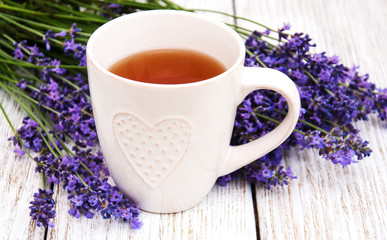 Obraz na płótnie Canvas Cup of tea and lavender