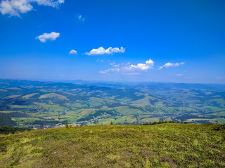 Fototapeta na wymiar Background landscape with Ukrainian Carpathian Mountains in the Pylypets