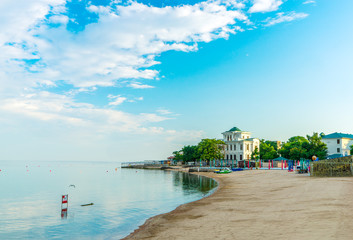 A beach and a sandy beach in the evening in Evpatoria, in Crimea