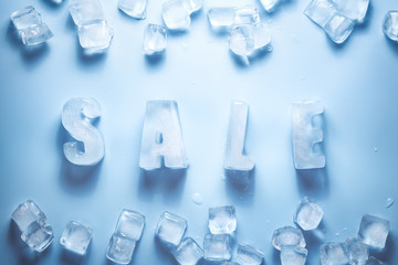 Ice letters SALE and ice cubes