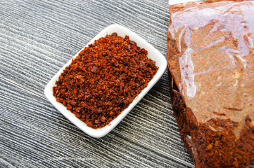 Dry red pepper on the white ground, pictures of natural and organic red hot peppers,
