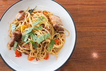 top view of pork pasta with red chili