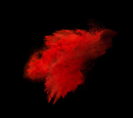 Colorful powder explosion isolated on black background