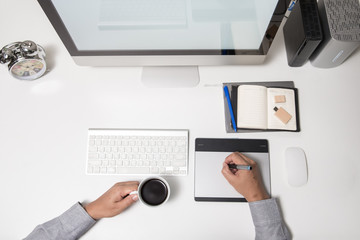 Man hand on computer keyboard on table top view
