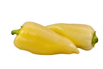 Two fresh sweet peppers on a white background