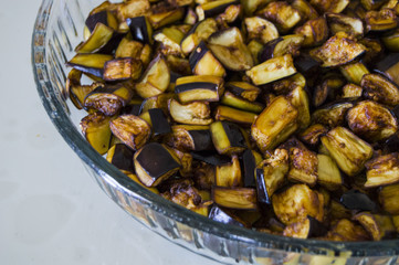 Chopped and fried eggplant pieces for eggplant meal
