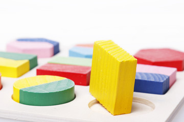 Square puzzle peg round hole