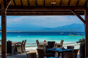 Scenics View of Tropical Island Beach Through Shore Restaurant