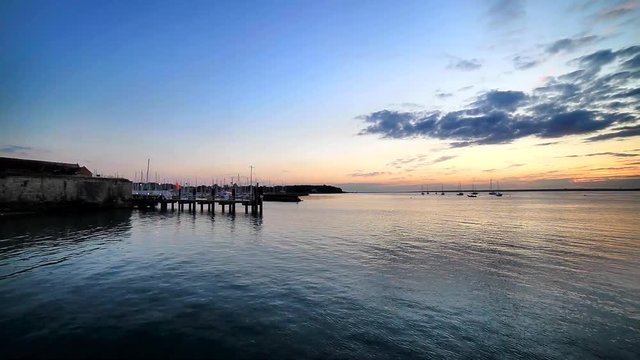 Yarmouth bay and harbour on the Isle of Wight (UK) at sunset