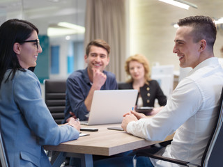 Startup Business Team At A Meeting at modern office building