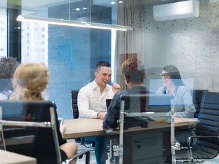 Startup Business Team At A Meeting at modern office building