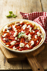 Grilled bell pepper. tomato and goat cheese tart