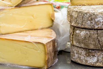 Close Up View of French Cheese on Traditional Market Stall