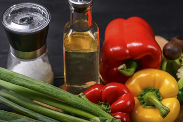 Obraz na płótnie Canvas Ingredients for salad on the table, vegetables, salt, oil