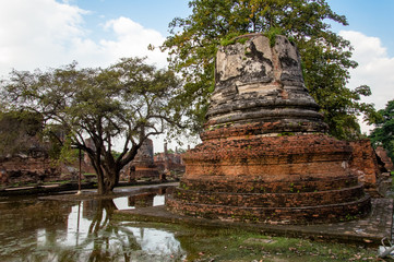 Fototapeta na wymiar Low Angle View of Old Traditional Stupa in Ayutthaya