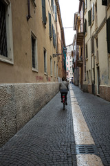 Fototapeta na wymiar Street in the historic city center of Verona. Italy