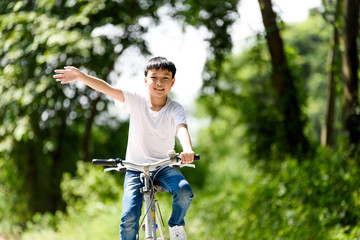 Young boy ride bicycle