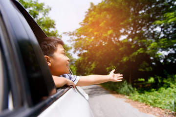 Boy in a crar on travel