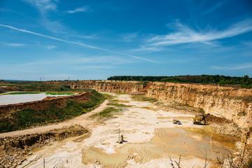 Fototapeta na wymiar Panoramic photo of big yellow quarry
