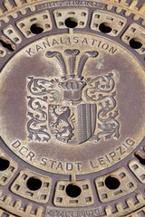 Manhole cover in the city of Leipzig in Saxony (Germany)