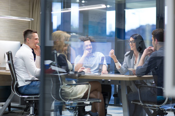 Startup Business Team At A Meeting at modern office building