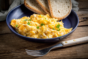 Scrambled eggs with onion and chives.