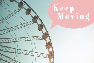 Inspiration quote on Ferris wheel background