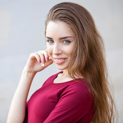 Portrait of a young beautiful brunette woman