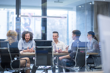 Startup Business Team At A Meeting at modern office building