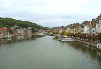 Fototapeta na wymiar The Meuse river at the historic beautiful town of Dinant, Wallonia region of Belgium 