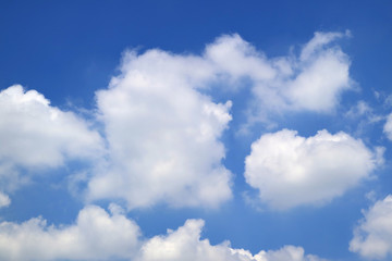 Obraz na płótnie Canvas Pure White Fluffy Cloud Floating on Vivid Blue Tropical Summer Sky of Thailand 